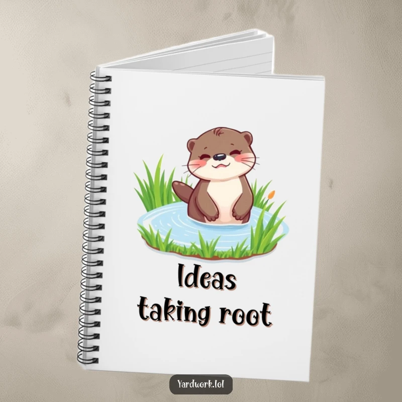 Funny notebook with a playful otter watering a patch of vibrant green grass. Ideal for journaling or note-taking.